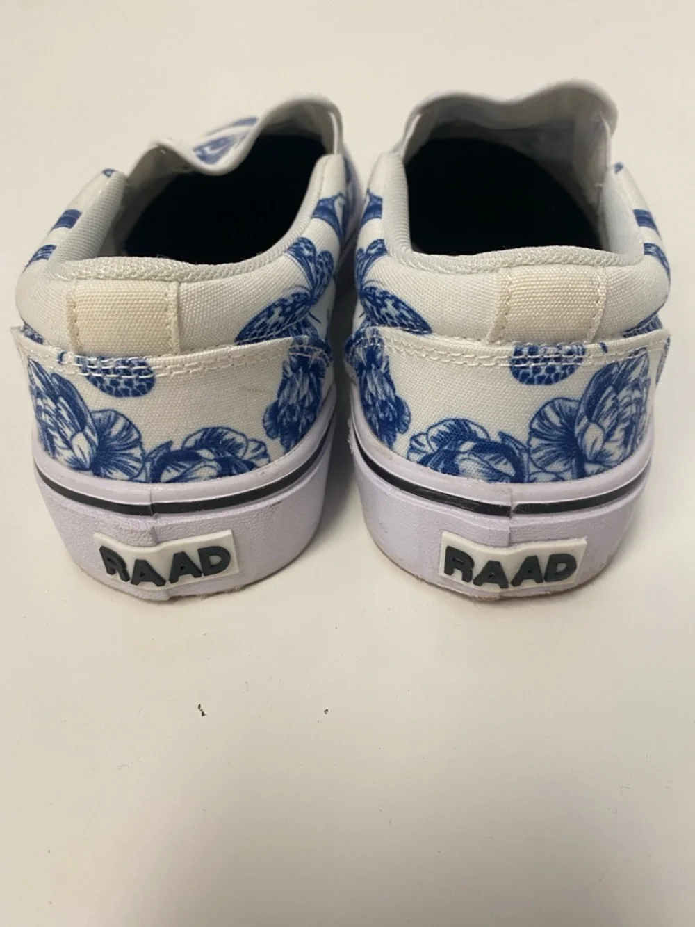 White Slip-On Women’s Sneakers with Blue Skull & Floral Print - Picture 4 of 5